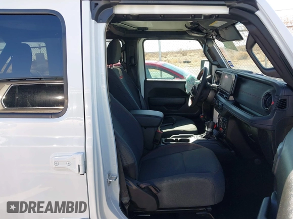 2025 Jeep Wrangler Rubicon with VIN 1C4PJXFN8SW527131, listed as a IAAI auction lot 41502676 with 1,051 mi miles and . Bid and sale history available at DreamBid. Image 5.