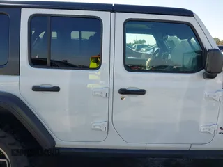 2024 Jeep Wrangler Rubicon with VIN 1C4PJXFG6RW291185, listed as a IAAI auction lot 41773050 with 12,400 mi miles and . Bid and sale history available at DreamBid. Image 13.