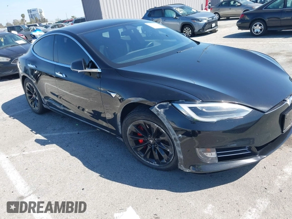 2017 Tesla Model S 100D with VIN 5YJSA1E21HF202591, listed as a IAAI auction lot 41983073 with 140,282 mi miles and . Bid and sale history available at DreamBid. Image 1.
