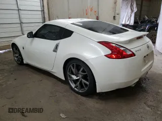 2013 Nissan 370Z Touring z VIN JN1AZ4EH5DM383466, wystawiony jako Copart lot #85704054 z przebiegiem 37 892 mil mil oraz Szkoda całkowita • Salvage title. Historia ofert i sprzedaży dostępna na DreamBid. Obrazek 2.