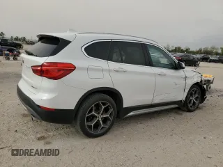 2019 BMW X1 sDrive28i with VIN WBXHU7C57K3H44192, listed as a Copart auction lot 49882335 with 79,350 mi miles and Salvage Title. Bid and sale history available at carsss.com. Image 3.