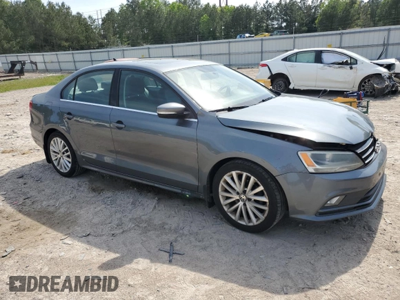 2015 Volkswagen Jetta SE z VIN 3VWD17AJ5FM309965, wystawiony jako Copart lot #54930665 z przebiegiem 141 918 mil mil oraz Szkoda całkowita • Salvage title. Historia ofert i sprzedaży dostępna na DreamBid. Obrazek 4.