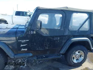 1999 Jeep Wrangler Sport with VIN 1J4FY19SXXP456810, listed as a IAAI auction lot 41725834 with 93,151 mi miles. Bid and sale history available at carsss.com. Image 14.