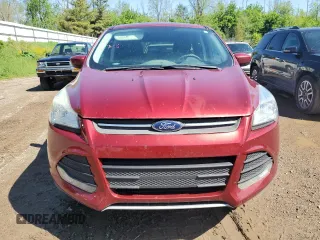 2016 Ford Escape SE z VIN 1FMCU9GX1GUA52213, wystawiony jako Copart lot #57137545 z przebiegiem 142 646 mil mil oraz Czysty tytuł • Clean title. Historia ofert i sprzedaży dostępna na DreamBid. Obrazek 5.
