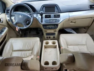 2010 Honda Odyssey Touring with VIN 5FNRL3H94AB056657, listed as a Copart auction lot 72658934 with 202,690 mi miles and Salvage title. Bid and sale history available at DreamBid. Image 8.