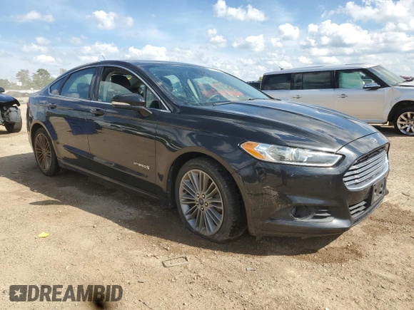 2013 Ford Fusion SE Hybrid с VIN 3FA6P0LU2DR181215, выставлен на аукционе Copart как лот 62474965 с пробегом 149 492 миль миль и Списание • Salvage title. История ставок и продаж доступна на DreamBid. Изображение 4.