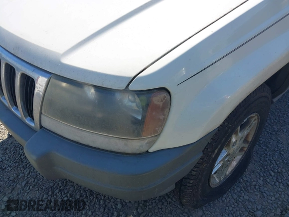 2002 Jeep Grand Cherokee Laredo with VIN 1J4GW48SX2C247709, listed as a IAAI auction lot 42444030 with 196,591 mi miles and . Bid and sale history available at DreamBid. Image 6.