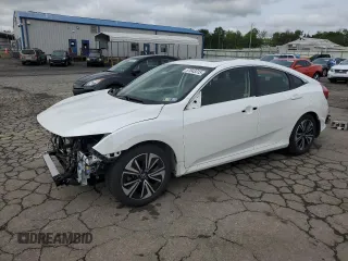 2018 Honda Civic EX-T z VIN JHMFC1F3XJX020689, wystawiony jako Copart lot #57043315 z przebiegiem 71 130 mil mil oraz Szkoda całkowita • Salvage title. Historia ofert i sprzedaży dostępna na DreamBid. Obrazek 1.