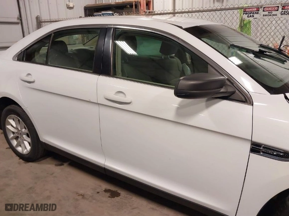 2014 Ford Taurus SE with VIN 1FAHP2D89EG178858, listed as a IAAI auction lot 40853995 with 136606 miles. Bid and sale history available at carsss.com. Image 14.