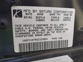 2002 Saturn SC with VIN 1G8ZY12792Z127824, listed as a IAAI auction lot 41760132 with 80,908 mi miles. Bid and sale history available at carsss.com. Image 9.