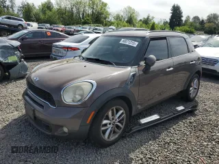 2011 MINI Countryman S z VIN WMWZC3C56BWH97944, wystawiony jako Copart lot #58071315 z przebiegiem 176 528 mil mil oraz Czysty tytuł • Clean title. Historia ofert i sprzedaży dostępna na DreamBid. Obrazek 1.