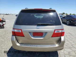 2005 Honda Odyssey EX-L with VIN 5FNRL38625B045152, listed as a Copart auction lot 57633005 with 145,776 mi miles and Salvage title. Bid and sale history available at DreamBid. Image 6.