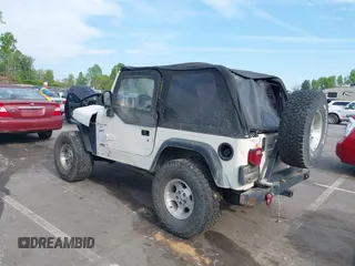 1998 Jeep Wrangler Sport with VIN 1J4FY19S5WP788331, listed as a IAAI auction lot 42027717 with 201,119 mi miles and . Bid and sale history available at DreamBid. Image 3.