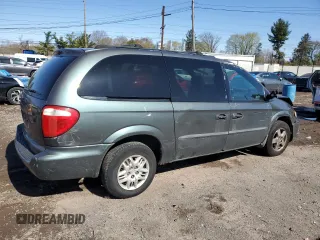 2004 Dodge Caravan SE with VIN 1D4GP24R04B520727, listed as a Copart auction lot 52002475 with 164,954 mi miles and Salvage title. Bid and sale history available at DreamBid. Image 3.