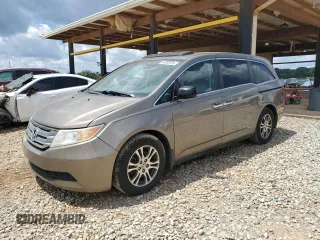 2013 Honda Odyssey EX-L with VIN 5FNRL5H61DB031799, listed as a Copart auction lot 64398185 with 175,080 mi miles and Clean title. Bid and sale history available at DreamBid. Image 1.