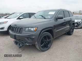 2015 Jeep Grand Cherokee Altitude with VIN 1C4RJEAG3FC219782, listed as a IAAI auction lot 42076212 with 194,910 mi miles. Bid and sale history available at carsss.com. Image 2.