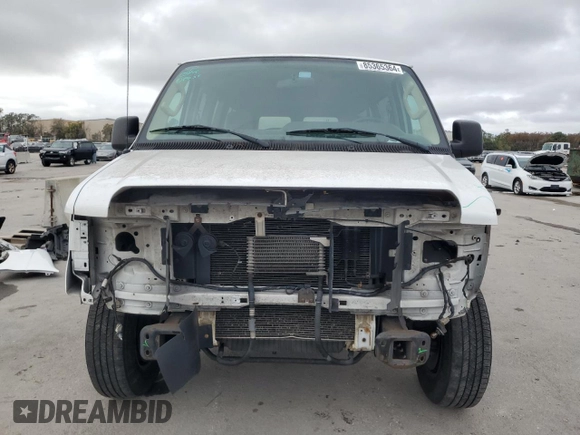 2011 Ford Econoline Passenger XL with VIN 1FBNE3BL1BDA61390, listed as a Copart auction lot 85365364 with 163,174 mi miles and Salvage Title. Bid and sale history available at carsss.com. Image 5.