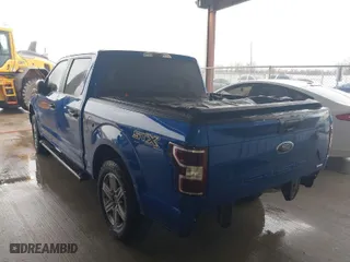 2018 Ford F-150 XL with VIN 1FTEW1CP9JKC79943, listed as a IAAI auction lot 41211868 with 103,035 mi miles. Bid and sale history available at carsss.com. Image 6.