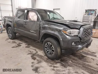 2020 Toyota Tacoma 4WD SR5 with VIN 3TMCZ5AN9LM355230, listed as a IAAI auction lot 41240351 with 122,164 mi miles. Bid and sale history available at carsss.com. Image 1.