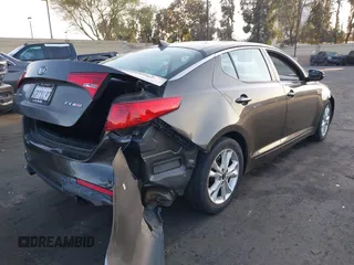 2011 Kia Optima EX with VIN KNAGN4A68B5086204, listed as a IAAI auction lot 41976276 with 177,439 mi miles and . Bid and sale history available at carsss.com. Image 4.