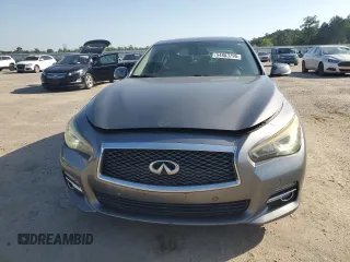 2014 Infiniti Q50 z VIN JN1BV7AR5EM704360, wystawiony jako Copart lot #54883795 z przebiegiem 156 301 mil mil oraz Szkoda całkowita • Salvage title. Historia ofert i sprzedaży dostępna na DreamBid. Obrazek 5.