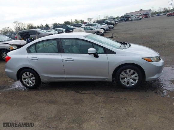 2012 Honda Civic Sdn LX with VIN 19XFB2F50CE353837, listed as a IAAI auction lot 41961162 with 140,583 mi miles. Bid and sale history available at carsss.com. Image 14.