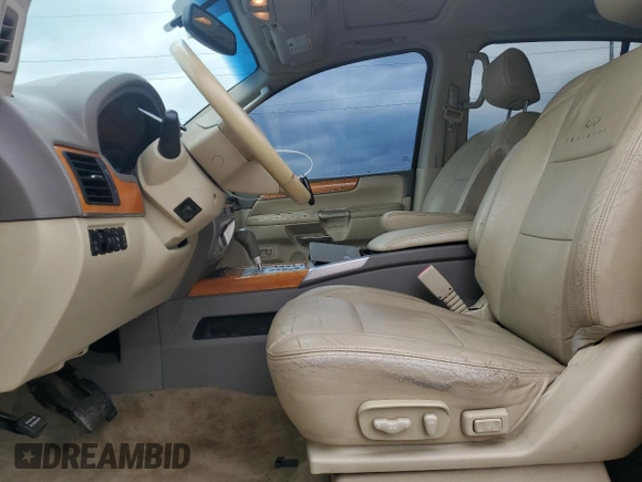 2010 Infiniti QX56 with VIN 5N3ZA0NE7AN901169, listed as a Copart auction lot 46459555 with 210,210 mi miles and Salvage Title. Bid and sale history available at DreamBid. Image 7.