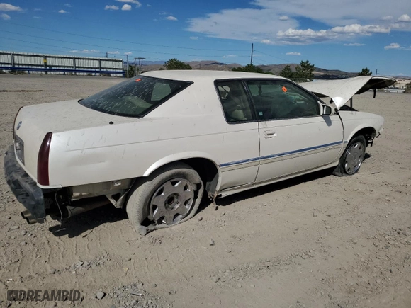 1994 Cadillac Eldorado Touring ETC with VIN 1G6ET1295RU606319, listed as a Copart auction lot 66999884 with 0 mi miles and Salvage Title. Bid and sale history available at carsss.com. Image 3.
