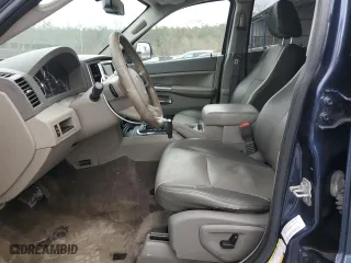 2009 Jeep Grand Cherokee Laredo with VIN 1J8HS48P79C532789, listed as a Copart auction lot 86679324 with 200,167 mi miles and Salvage Title. Bid and sale history available at carsss.com. Image 7.