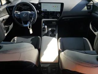 2023 Lexus NX 350h Luxury with VIN JTJHKCEZ7P2013703, listed as a Copart auction lot 74935304 with 22,069 mi miles and Salvage Title. Bid and sale history available at DreamBid. Image 8.