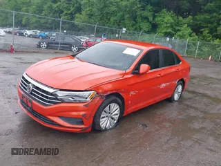 2019 Volkswagen Jetta S z VIN 3VWCB7BU8KM232522, wystawiony jako IAAI lot #42256559 z przebiegiem 118 141 mil mil oraz . Historia ofert i sprzedaży dostępna na DreamBid. Obrazek 17.