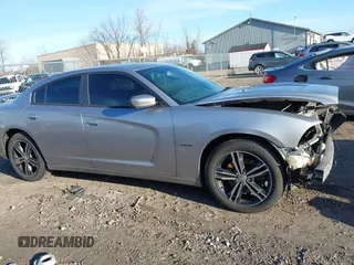 2014 Dodge Charger RT Plus with VIN 2C3CDXDT1EH124140, listed as a IAAI auction lot 41876248 with 127,399 mi miles. Bid and sale history available at carsss.com. Image 14.