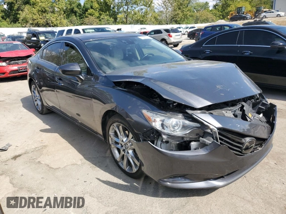 2014 Mazda 6 i Grand Touring с VIN JM1GJ1W67E1135264, выставлен на аукционе Copart как лот 70587624 с пробегом 86 926 миль миль и Списание • Salvage title. История ставок и продаж доступна на DreamBid. Изображение 4.