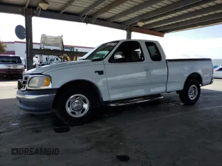 2001 Ford F-150 XL z VIN 1FTRX17WX1KF39735, wystawiony jako Copart lot #51261115 z przebiegiem Nie podano mil oraz Szkoda całkowita • Salvage title. Historia ofert i sprzedaży dostępna na DreamBid. Obrazek 1.