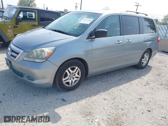 2005 Honda Odyssey EX-L with VIN 5FNRL38755B014826, listed as a IAAI auction lot 42147100 with 145,484 mi miles. Bid and sale history available at carsss.com. Image 2.