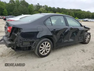2012 Volkswagen Jetta SE with VIN 3VWDP7AJ3CM451497, listed as a Copart auction lot 58322715 with 180,266 mi miles and Salvage title. Bid and sale history available at DreamBid. Image 3.