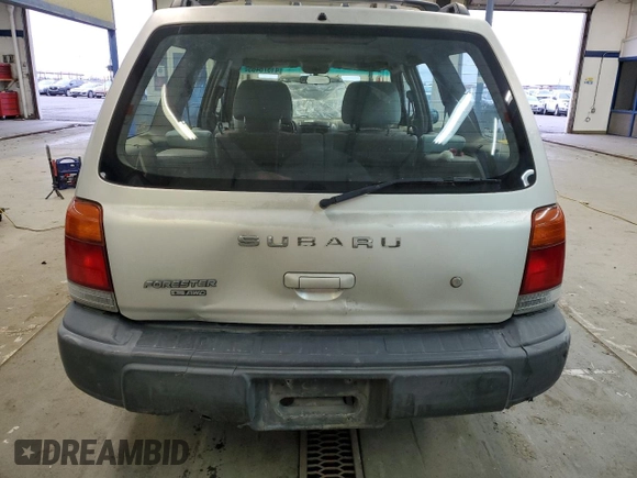 1999 Subaru Forester L with VIN JF1SF6350XH747102, listed as a Copart auction lot 41376465 with 199,771 mi miles and Salvage Title. Bid and sale history available at carsss.com. Image 6.