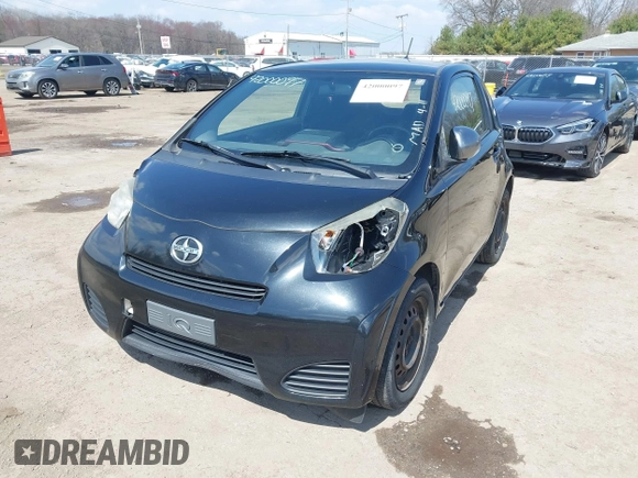 2012 Scion iQ with VIN JTNJJXB03CJ018302, listed as a IAAI auction lot 42000097 with 191,918 mi miles. Bid and sale history available at carsss.com. Image 2.