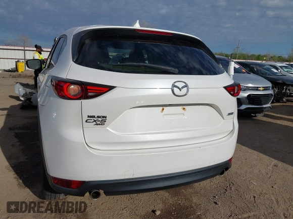 2019 Mazda CX-5 Grand Touring with VIN JM3KFBDM8K0518576, listed as a IAAI auction lot 41854296 with 88,706 mi miles and . Bid and sale history available at carsss.com. Image 16.