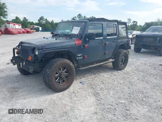 2007 Jeep Wrangler Unlimited Sahara with VIN 1J4GB59167L221686, listed as a IAAI auction lot 42473996 with 151,065 mi miles and . Bid and sale history available at DreamBid. Image 2.