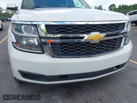 2015 Chevrolet Tahoe Commercial z VIN 1GNLC2EC1FR721538, wystawiony jako IAAI lot #42274601 z przebiegiem 138 991 mil mil oraz . Historia ofert i sprzedaży dostępna na DreamBid. Obrazek 6.