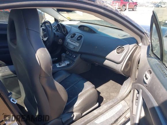 2011 Mitsubishi Eclipse GS with VIN 4A31K5DF1BE002479, listed as a IAAI auction lot 41880392 with 130,225 mi miles. Bid and sale history available at carsss.com. Image 5.