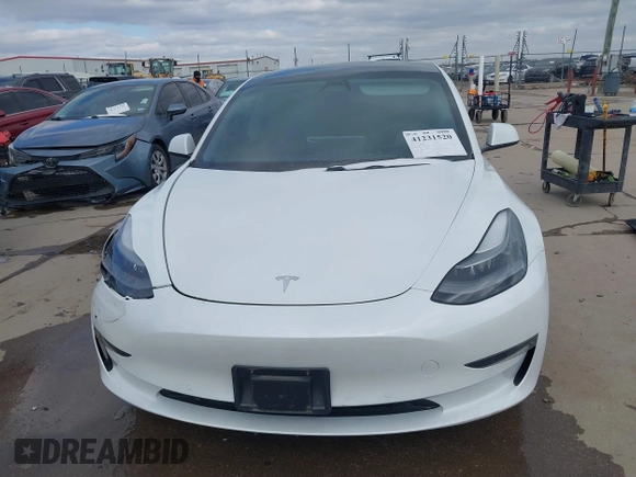 2021 Tesla Model 3 Long Range with VIN 5YJ3E1EB9MF059554, listed as a IAAI auction lot 41231520 with 63,696 mi miles and . Bid and sale history available at DreamBid. Image 11.