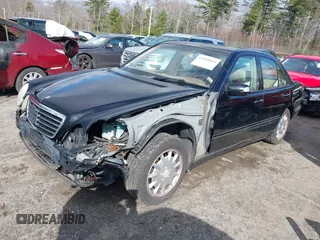 2000 Mercedes-Benz E-Class with VIN WDBJF82J2YX037818, listed as a IAAI auction lot 41910044 with 163,240 mi miles. Bid and sale history available at carsss.com. Image 2.