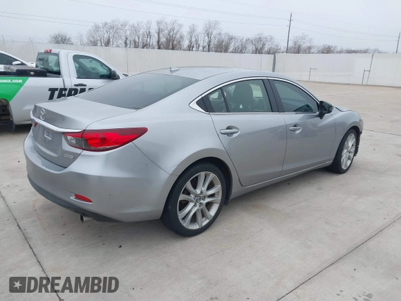 2015 Mazda 6 i Touring with VIN JM1GJ1V56F1209476, listed as a IAAI auction lot 41644215 with 112,255 mi miles. Bid and sale history available at carsss.com. Image 4.