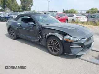 2021 Ford Mustang EcoBoost z VIN 1FATP8UH8M5123051, wystawiony jako IAAI lot #42356468 z przebiegiem 73 623 mil mil oraz . Historia ofert i sprzedaży dostępna na DreamBid. Obrazek 1.