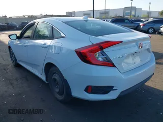 2018 Honda Civic EX with VIN 2HGFC2F79JH508824, listed as a IAAI auction lot 41965869 with 56,966 mi miles and . Bid and sale history available at DreamBid. Image 3.