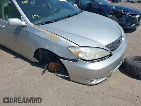 2004 Toyota Camry LE with VIN 4T1BE32K24U817748, listed as a IAAI auction lot 42155150 with 158,437 mi miles and . Bid and sale history available at DreamBid. Image 6.