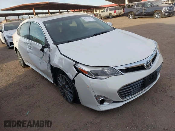 2015 Toyota Avalon Limited with VIN 4T1BK1EBXFU157728, listed as a IAAI auction lot 41551042 with 82,979 mi miles and . Bid and sale history available at DreamBid. Image 1.