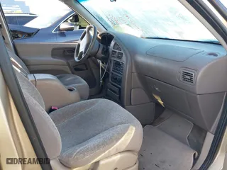 1999 Nissan Quest GXE with VIN 4N2XN11T8XD817151, listed as a IAAI auction lot 41845448 with 174,750 mi miles. Bid and sale history available at carsss.com. Image 5.